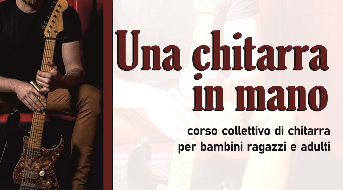 UNA CHITARRA IN MANO